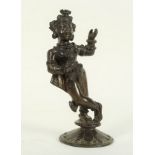 An Indian bronze figure, Krishna dancing, possibly 18th Century, 23.