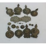 A quantity of Eastern white metal, mainly Burmese, including buckle, buttons etc.