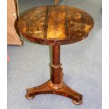 A Regency rosewood circular table on a flat tripod base,