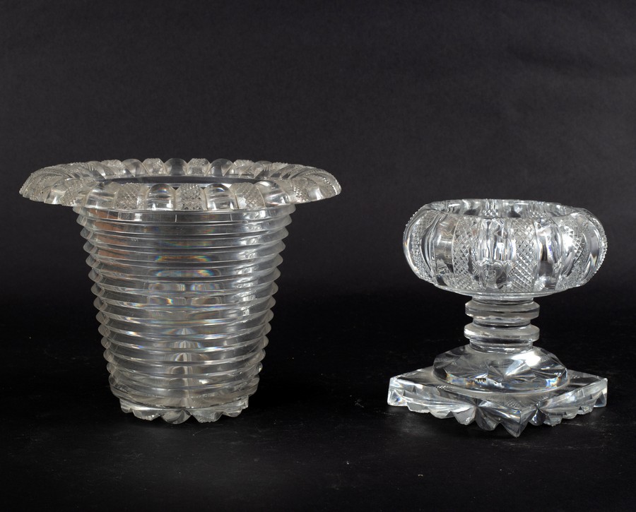 A cut glass vase of inverted hat form with flanged top,