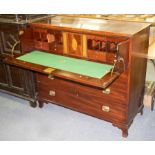 A Regency mahogany secretaire chest with three drawers beneath, on bracket feet,