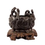 A Japanese bronze planter, Meiji period, signed Yoshitani/Bikoku,