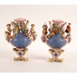 A pair of Meissen vases, circa 1860, modelled as two of the Four Seasons, with figural handles,