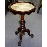 A Victorian marble top tripod table,