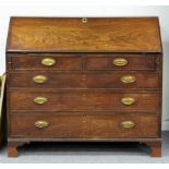 A George III mahogany bureau, the fall with three long and two short drawers beneath,