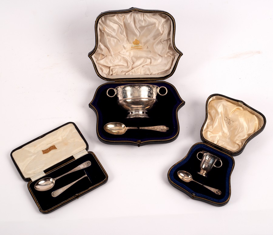 A silver Christening bowl and spoon, Wakely & Wheeler, London 1916/1919, a silver egg cup and spoon,