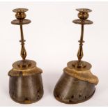 A pair of taxidermy horse hoof candlesticks, mounted by the Army & Navy Cooperative Society Ltd.