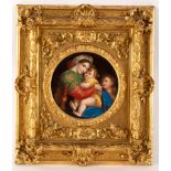 A circular porcelain plaque, La Madonna della Seggiola after Raphael, 18.