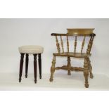 A pine spindle back chair with solid elm seat on turned legs and a circular stool on tapering