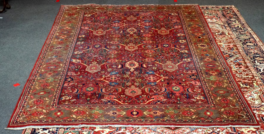 A Persian Mahal carpet, early 20th Century, with all over design within a foliate border,