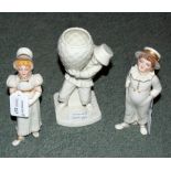 A pair of Royal Worcester Kate Greenaway figures modelled as sugar sifters by James Hadley,