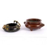 A Chinese bronze censer with mask handles and another with dragon handles, both 9.