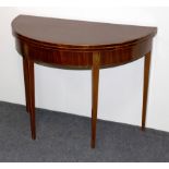 A George III mahogany tea table,