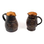 Two Doulton stoneware jugs, the Landlord's Invitation and the Landlord's Caution,