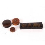 Three turned wood boxes, the largest 8cm diameter and a decorative lacquer pen case,