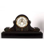 A Victorian black slate mantel clock with eight-day movement, 59.