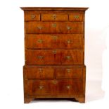 An 18th Century walnut tallboy with moulded cornice,