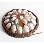 A pendant ceiling light, the shade of stained glass and mother-of-pearl shells,