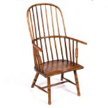 A Windsor type stick back chair with elm seat,