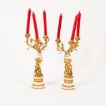 A pair of ormolu three-branch,