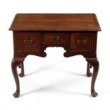 A George II walnut lowboy fitted three drawers to the kneehole base, on cabriole legs, 81.