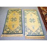 A near pair of Chinese Ningxia rugs, each 147cm x 70cm, a Tekke rug circa 1930 114cm x 153cm,