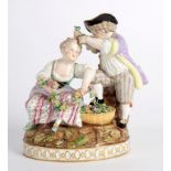 A Meissen figure group of Spring, modelled as a girl and boy making flower garlands, F.