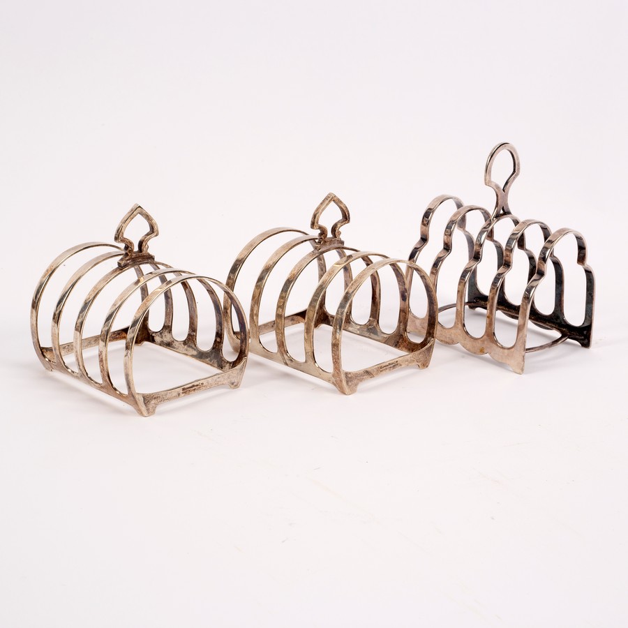 A pair of silver five-bar toast racks, Mappin & Webb, Sheffield 1903,