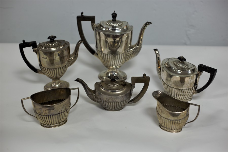 A four-piece silver tea and coffee service, HM, Birmingham 1896,