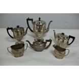 A four-piece silver tea and coffee service, HM, Birmingham 1896,