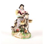 A Chelsea Derby figure, The Travelling Tailor's Wife astride a Goat, 14cm high,