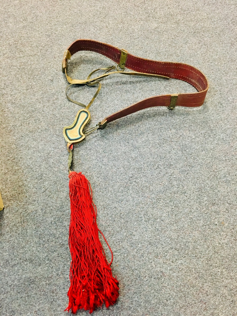 A Tibetan red leather horse strap with pierced silver coloured metal mounts, - Image 9 of 10