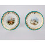 A pair of Minton plates painted sheep and goats, circa 1880, crowned garter,
