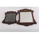 An 18th Century mahogany wall mirror with gilded griffin surmount,