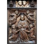 An 18th Century carved Flemish panel, the Virgin with the Holy Innocents,