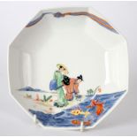 A modern Meissen octagonal dish, painted Chinese ladies and carp,