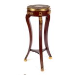 A Louis XVI style jardinière stand with marble top and gilt metal mounts, on square S-shaped legs,