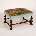 A rectangular Flemish oak stool, the needlework top with scene of a stag hunt,