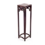 A small Chinese hardwood stand on square supports,