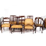 A Regency mahogany armchair with horizontal splat to the back, another with pierced splat,