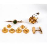 Six 9ct gold shirt studs, approximately 5gm, an 18ct gold cufflink approximately 3.