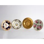 A group of four English porcelain plates, mid to late 19th Century, comprising,