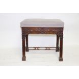 A rectangular mahogany stool of Chinese Chippendale design,