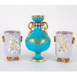 A Minton turquoise ground baluster two-handled vase enriched in gilt scrolls, circa 1875,