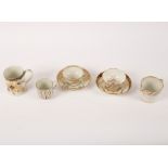 A group of Worcester gilt and blue teawares, circa 1770-80, comprising a mug, teabowl and saucer,