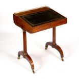 A George IV mahogany skeleton Davenport with three-quarter gallery and leather lined slope,