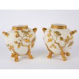 A pair of Royal Worcester basket weave moulded flattened ovoid vases,