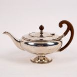A silver teapot, JR, Sheffield 1918, of circular form with fruitwood finial and handle,