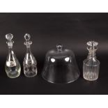 Three glass decanters,