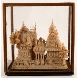 An extremely fine late 19th Century Indian paperwork diorama of a temple with figures to the